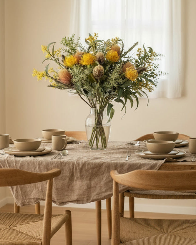 Bouquet of flowers in a clear vase on a table