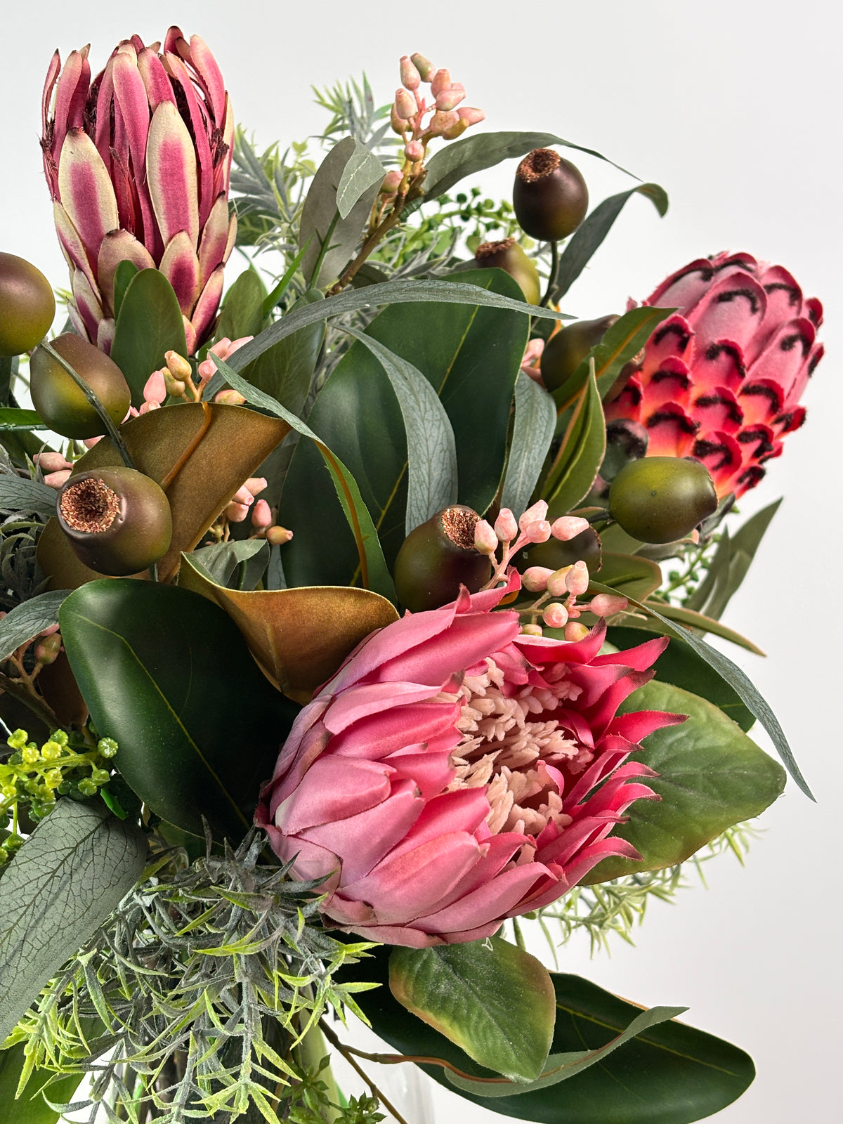 Au native flowers protea-style blooms, native greenery, eucalyptus-style leaves, and textured foliage