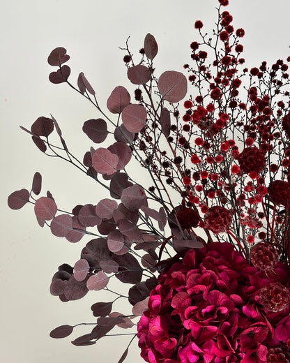 Bouquet of red flowers on a light background
