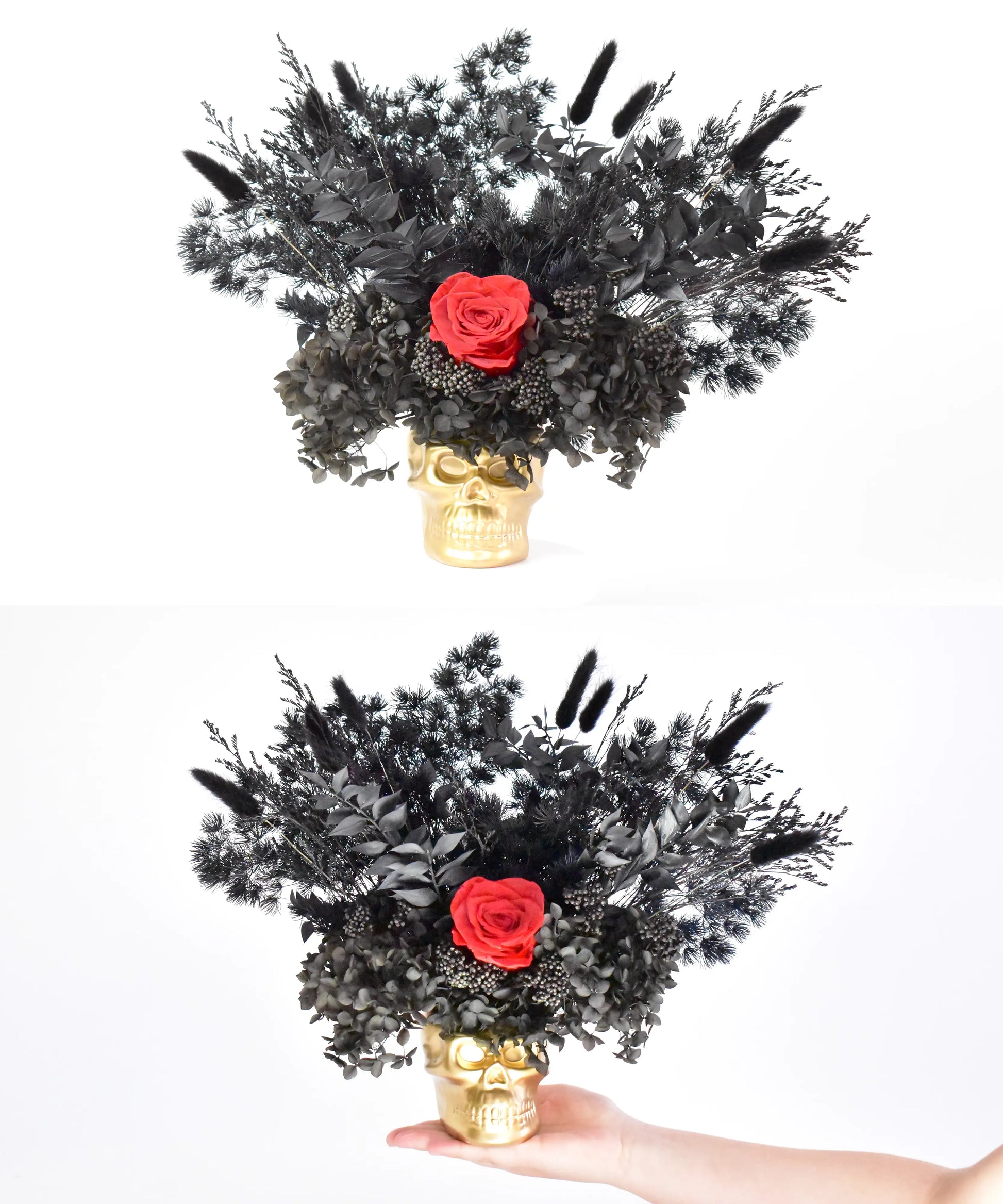 Golden skull with dried flower arrangement featuring red roses, black hydrangea, and black pampas grass.