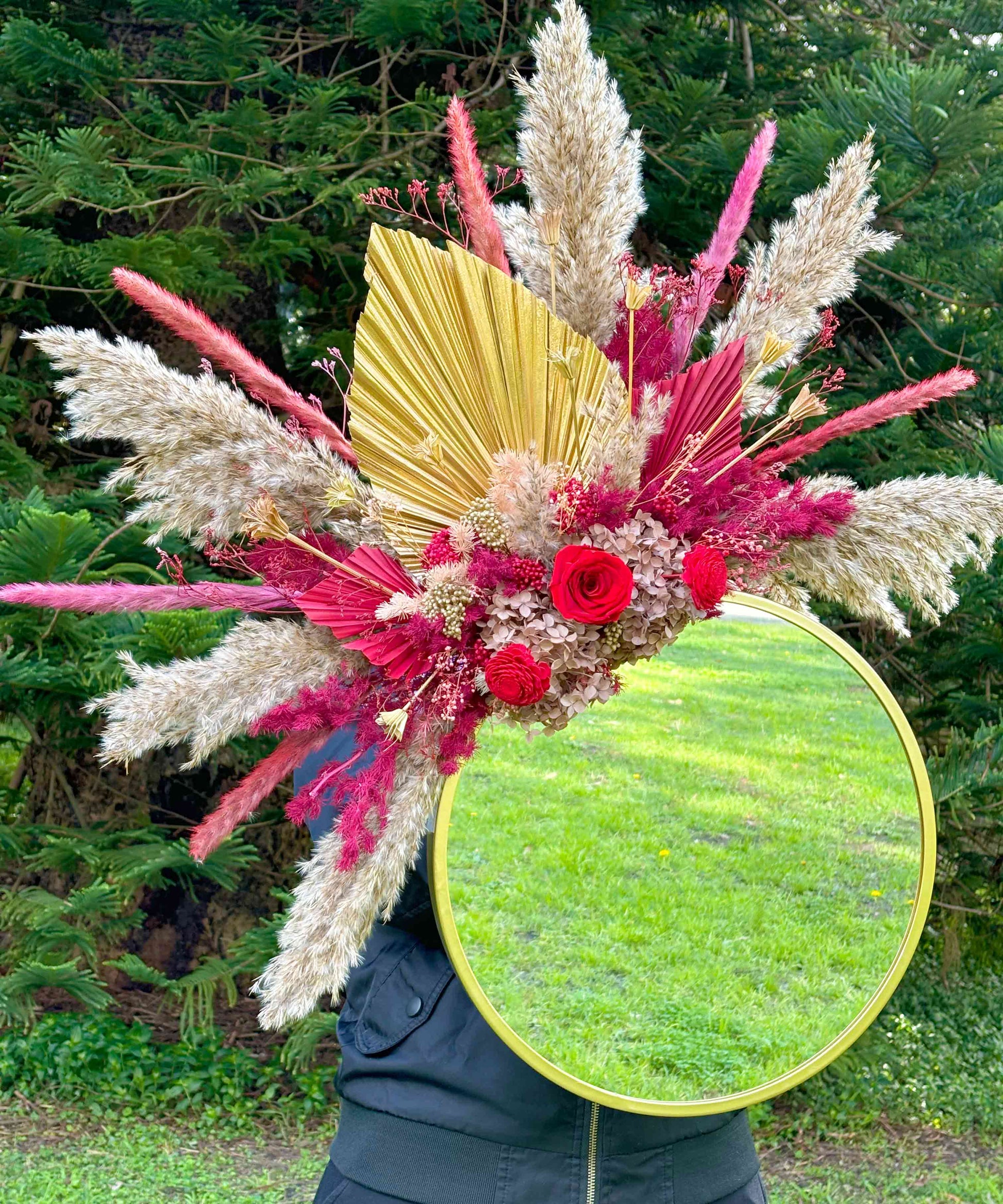 red mirror with flowers