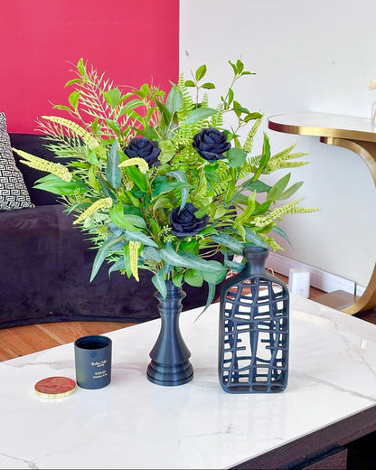 artificial centerpiece arrangementt with black roses in modern black vase