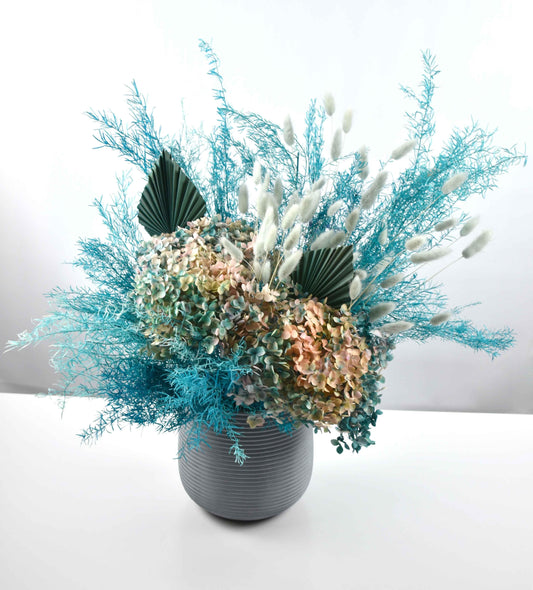 Blue Smoke Preserved Flowers arrangement with Hydrangea, Bunny Tail Grass, Fern, and Palm Leaves